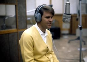 A young Glen Campbell recording in the studio